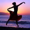Dramatic-image-of-a-woman-dancing-by-the-ocean-at-sunset-640294_ml-450x450px
